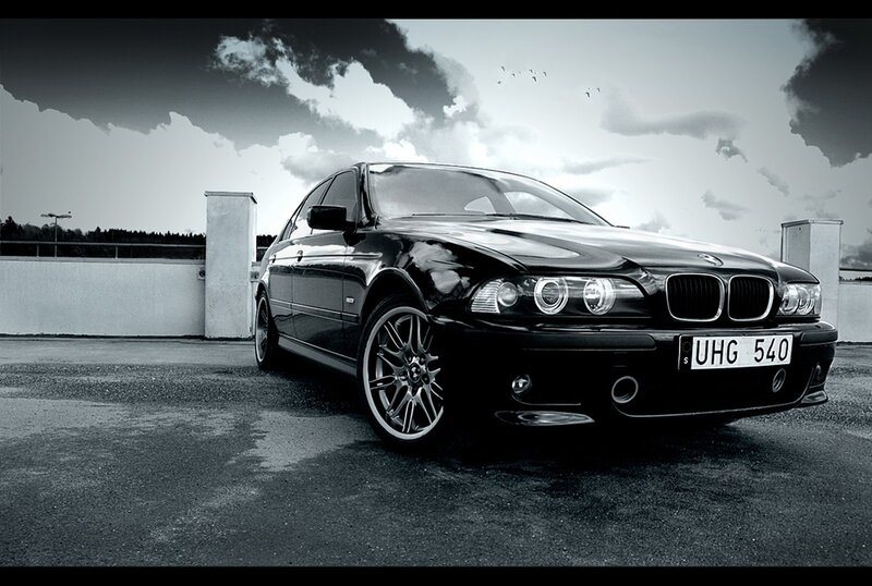 Black BMW on rooftop
