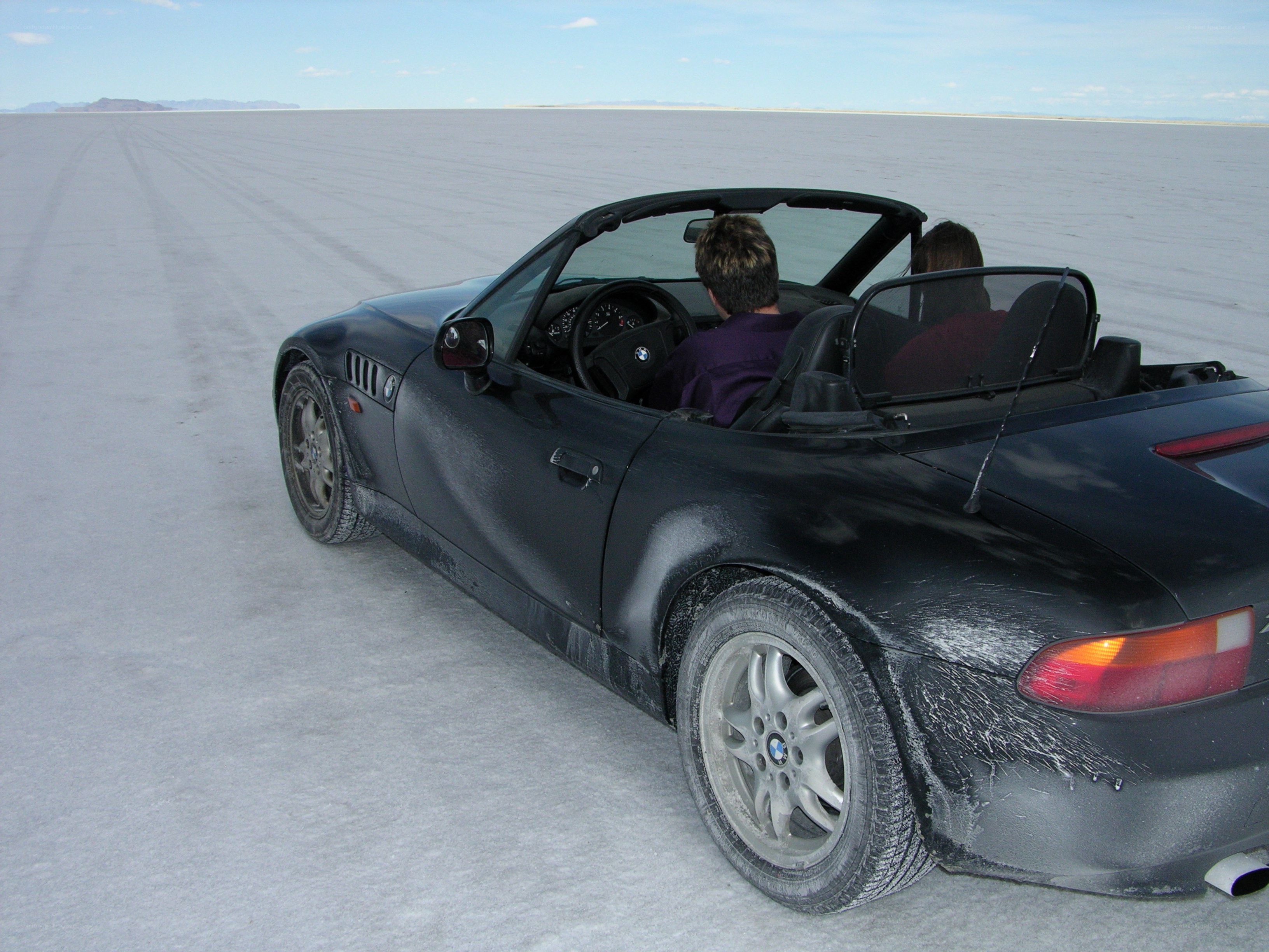 Black BMW on salt flat