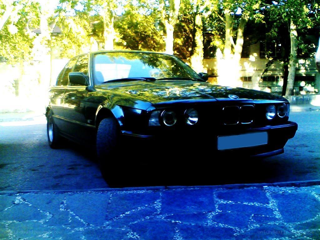 black bmw parked on street