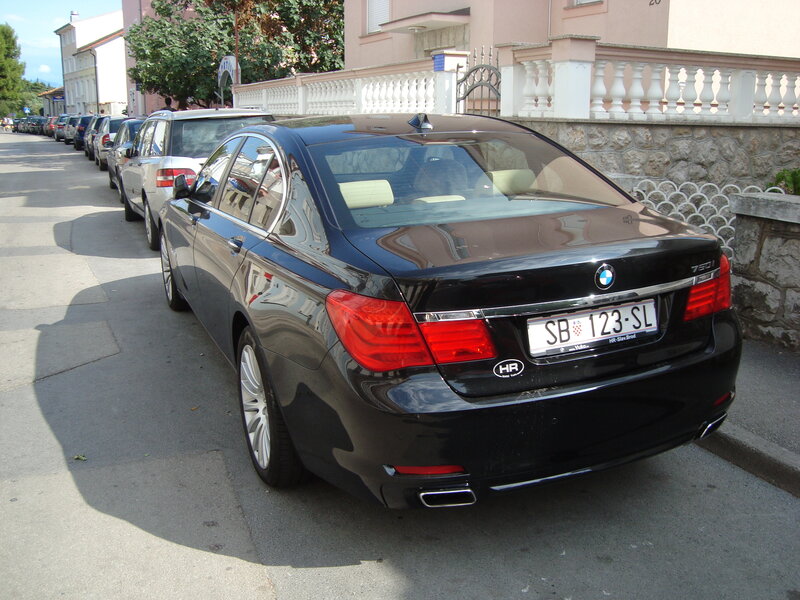 Black BMW parked on street