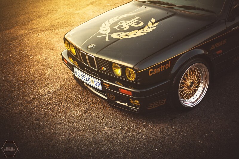 Black BMW Race Car — Dramatic, Sunset, Photograph