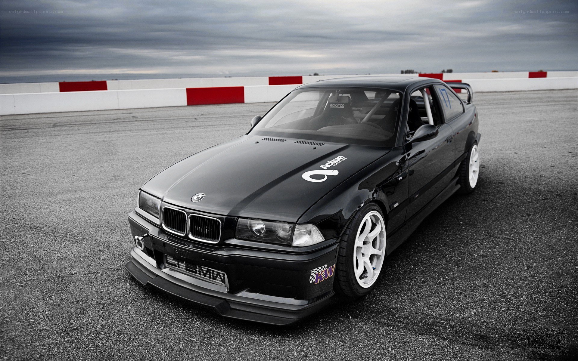 Black BMW race car on track