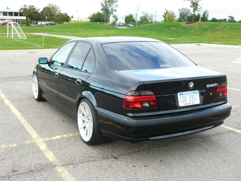 Black BMW Sedan — Calm, Afternoon, Photograph, Car
