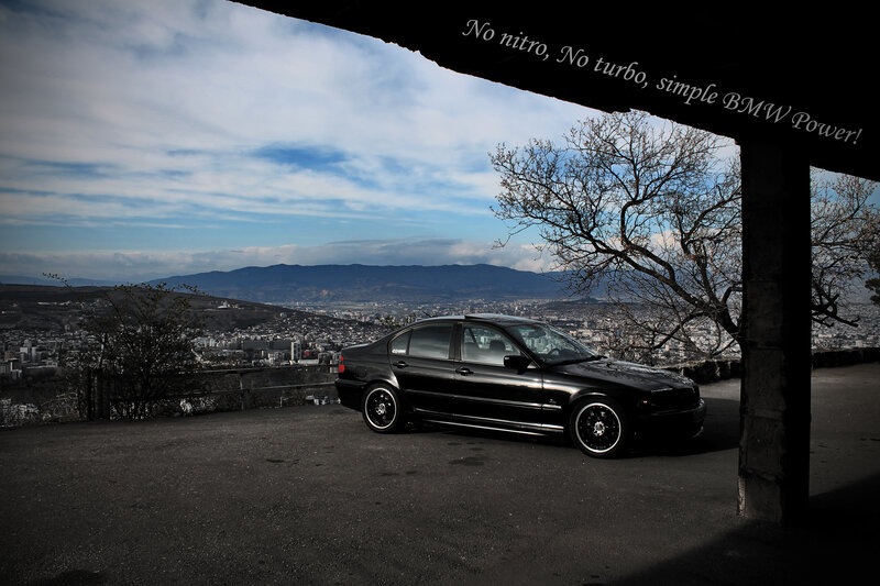 Black BMW Sedan — Dramatic, Afternoon, Photograph