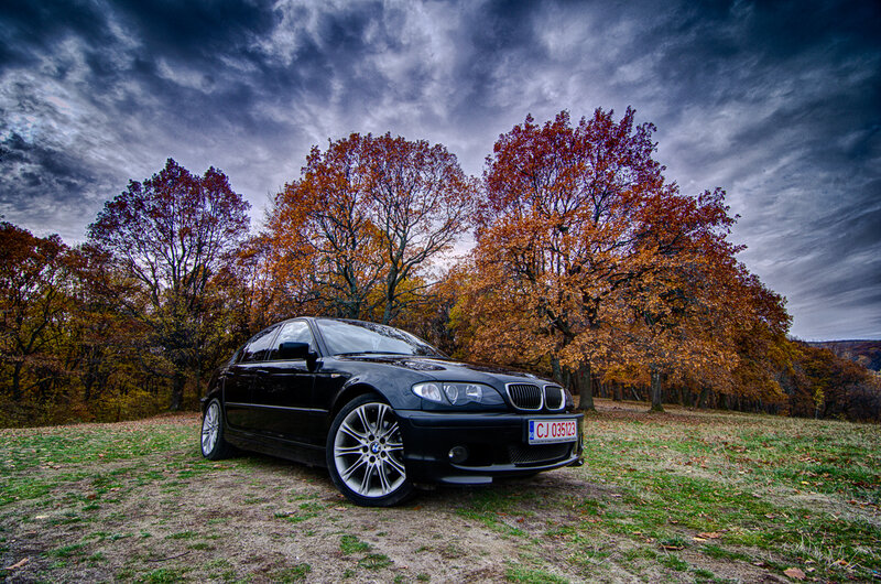 Black BMW Sedan — Dramatic, Autumn
