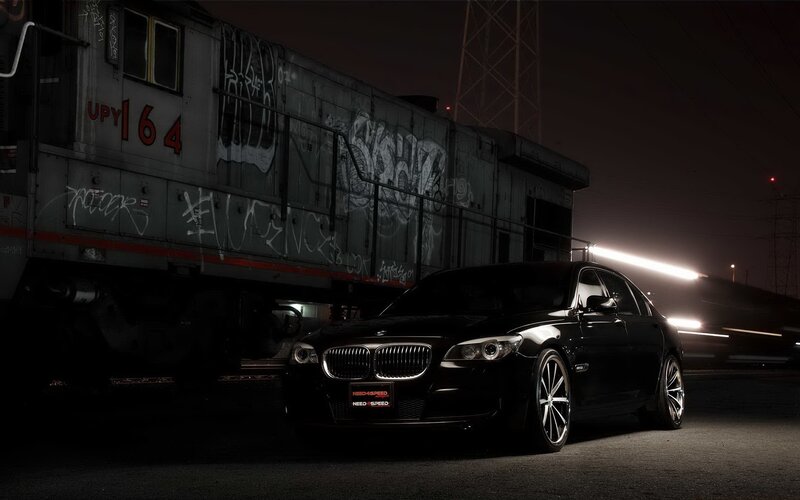 Black BMW Sedan — Dramatic, Night, Photograph, Train Car