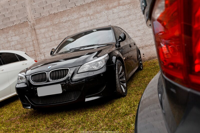 Black Bmw Sedan — Dramatic, Photograph, White Car
