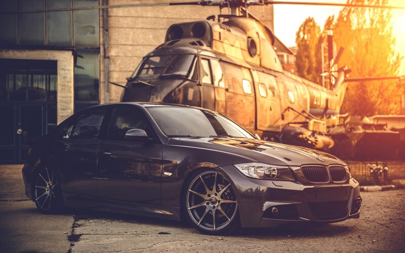 Black BMW Sedan — Dramatic, Sunset, Photograph, Helicopter