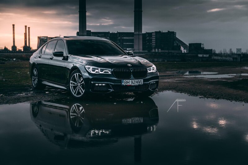 Black BMW Sedan — Dramatic, Sunset, Photograph, Puddle