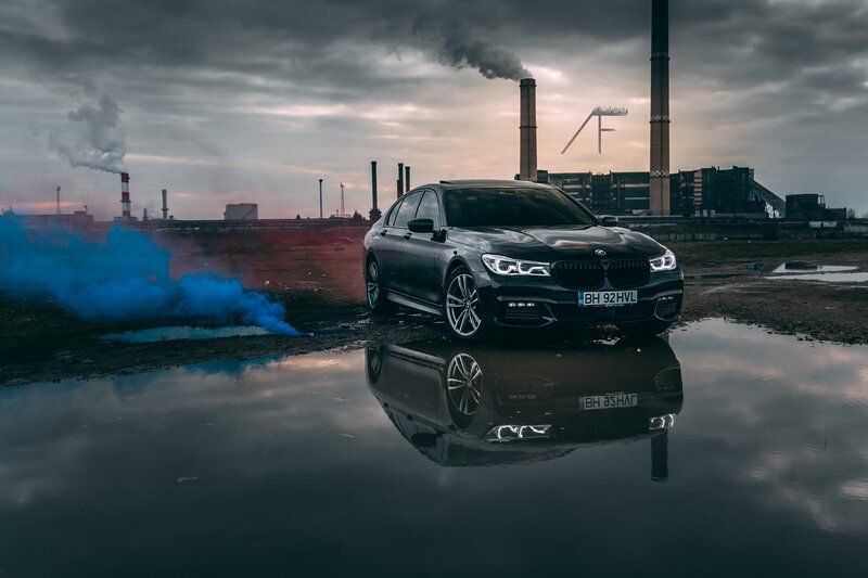Black BMW Sedan — Dramatic, Sunset, Photograph, Smoke