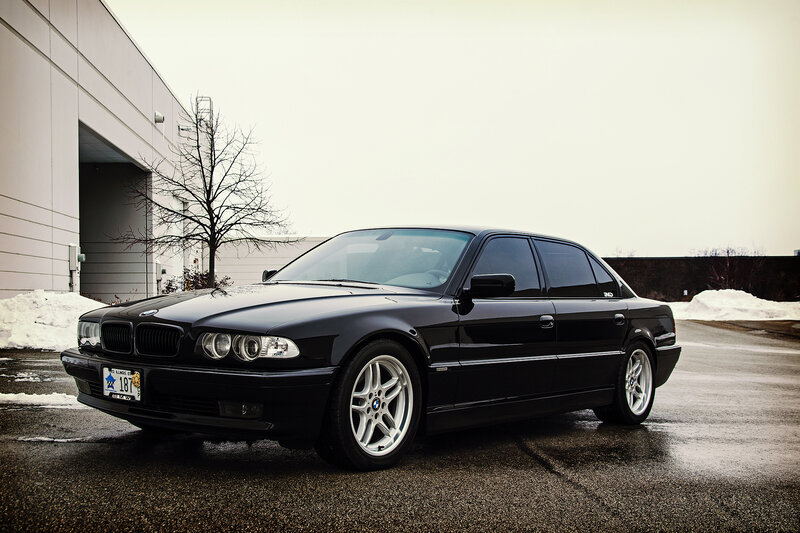 Black BMW Sedan — Dramatic, Winter