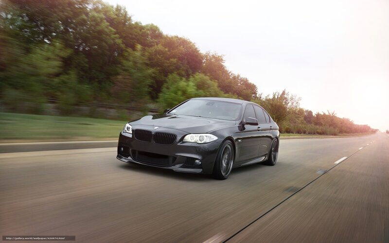 Black BMW Sedan — Dynamic, Sunset