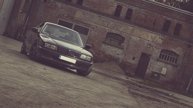 Black BMW Sedan — Gray, Gritty