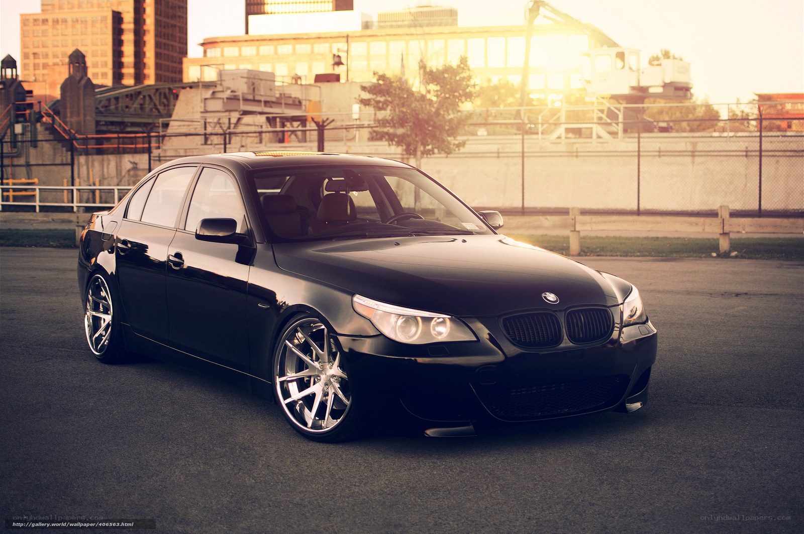 black bmw sedan in city