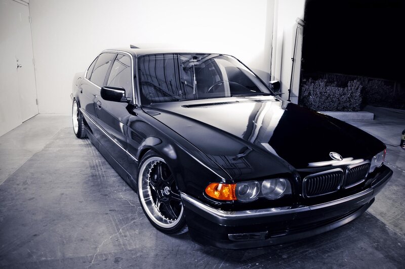 black bmw sedan in garage