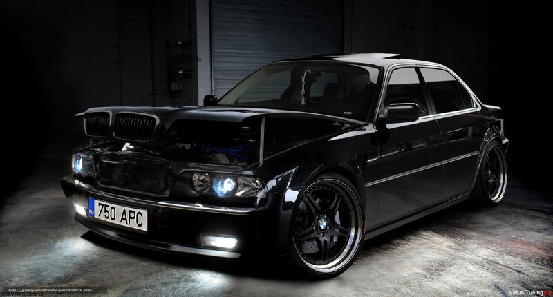 black bmw sedan in garage