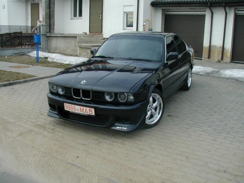 Black BMW Sedan — Neutral, Winter