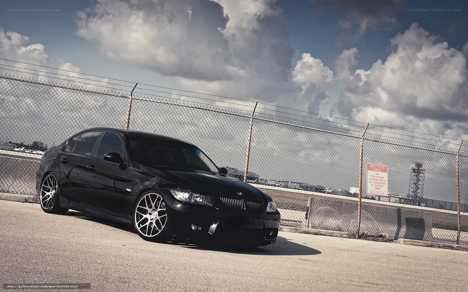 Black BMW sedan on a rooftop