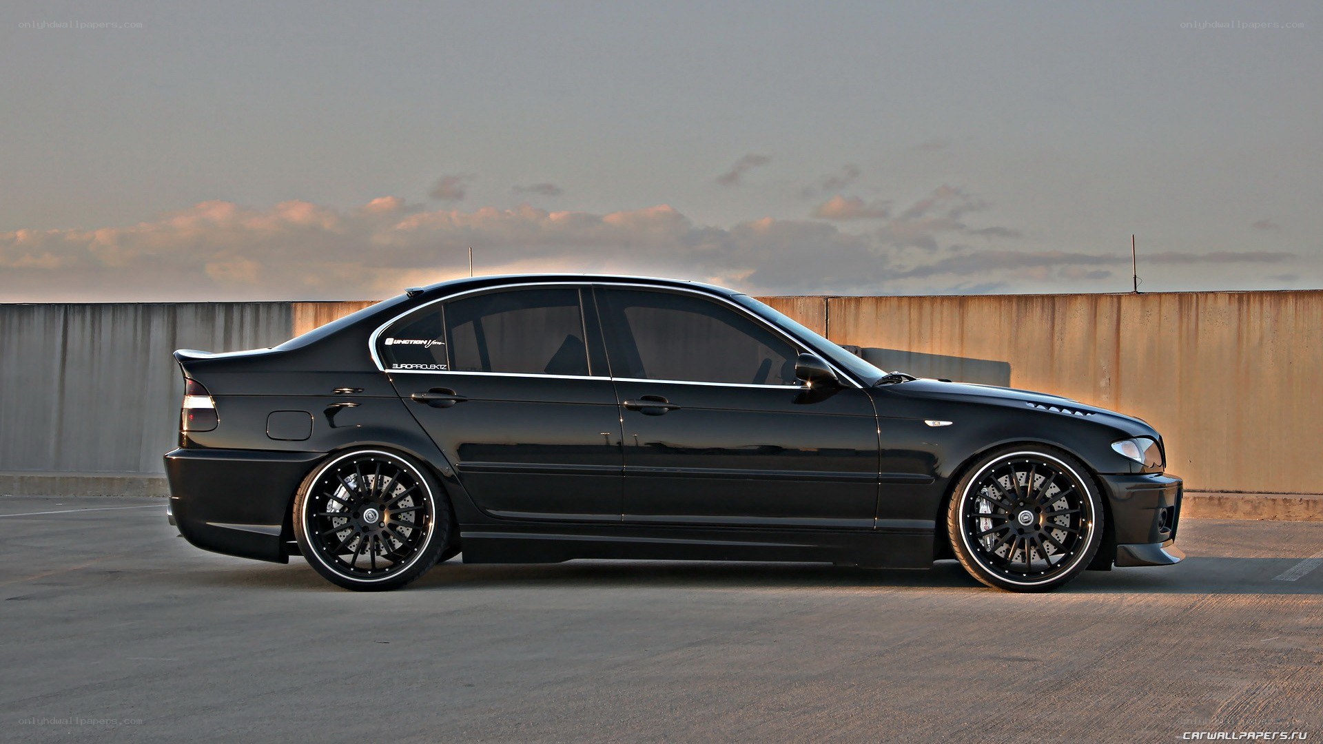 black bmw sedan on rooftop