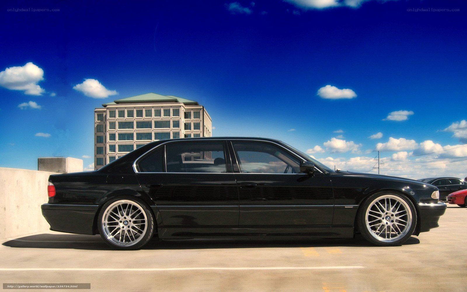 Black BMW sedan on rooftop