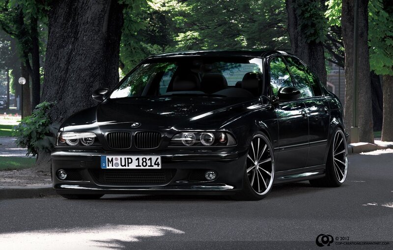 black bmw sedan on street
