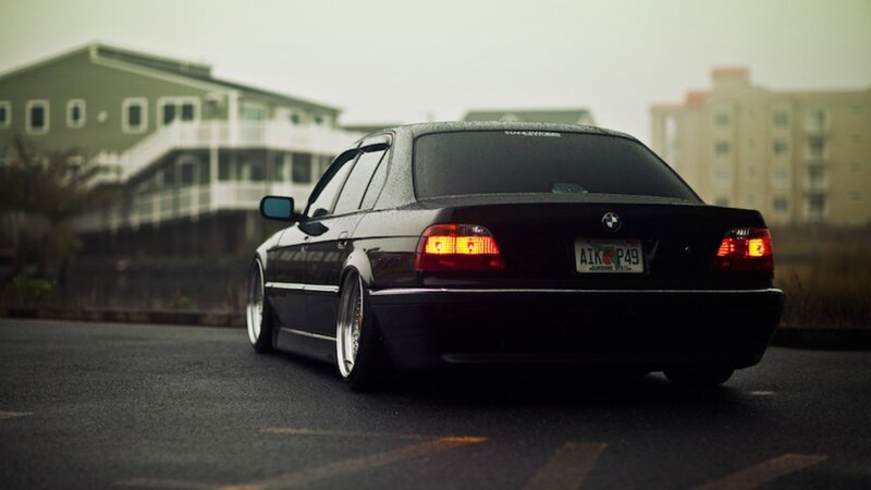 black bmw sedan on street