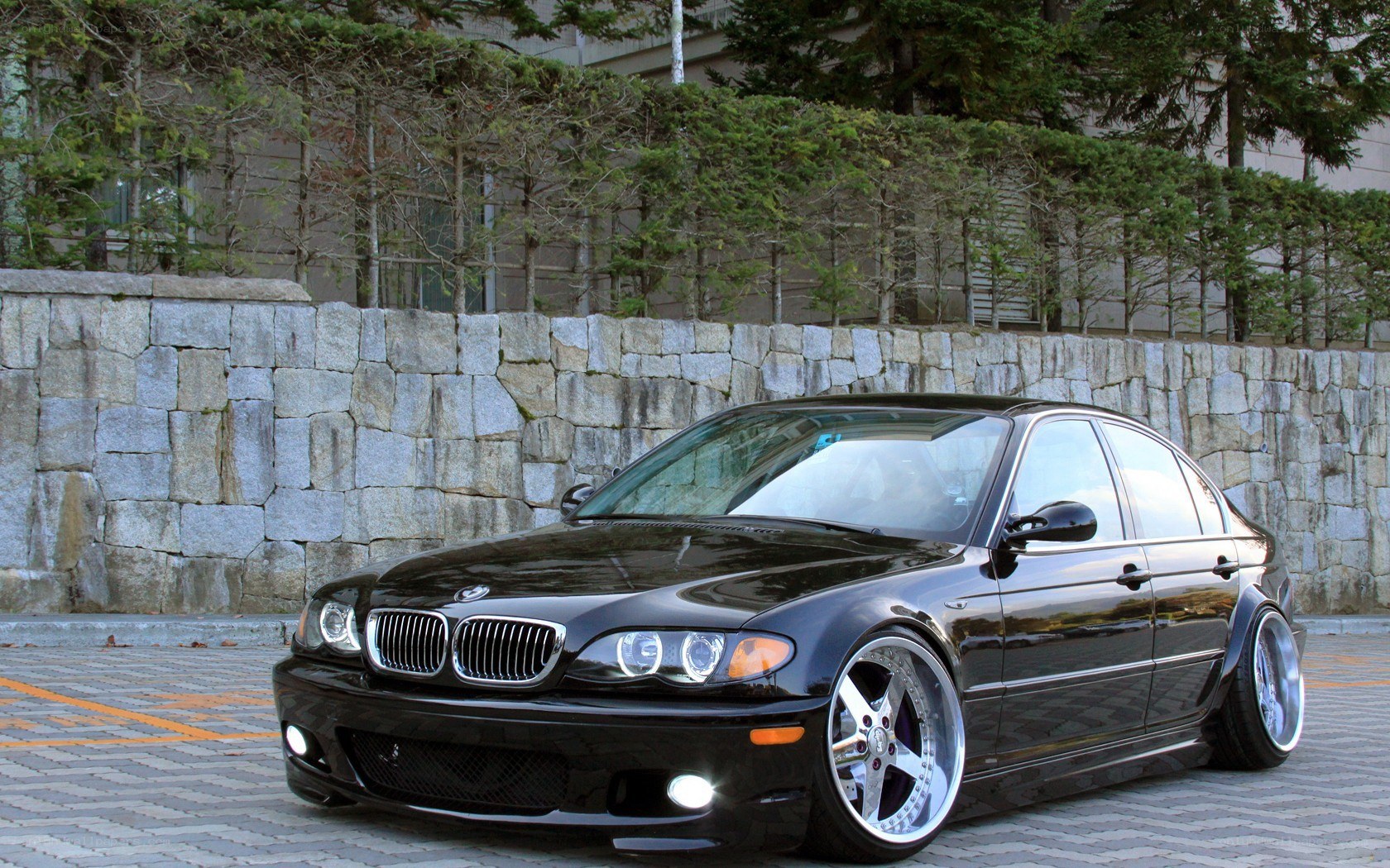 black bmw sedan parked