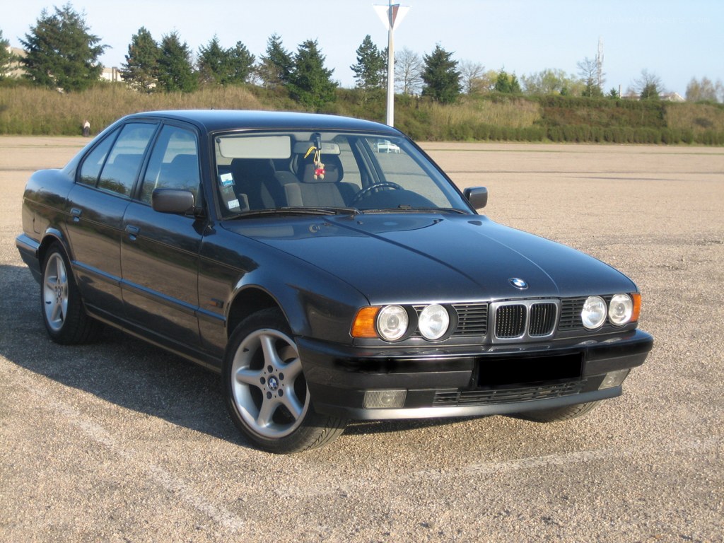 black bmw sedan parked