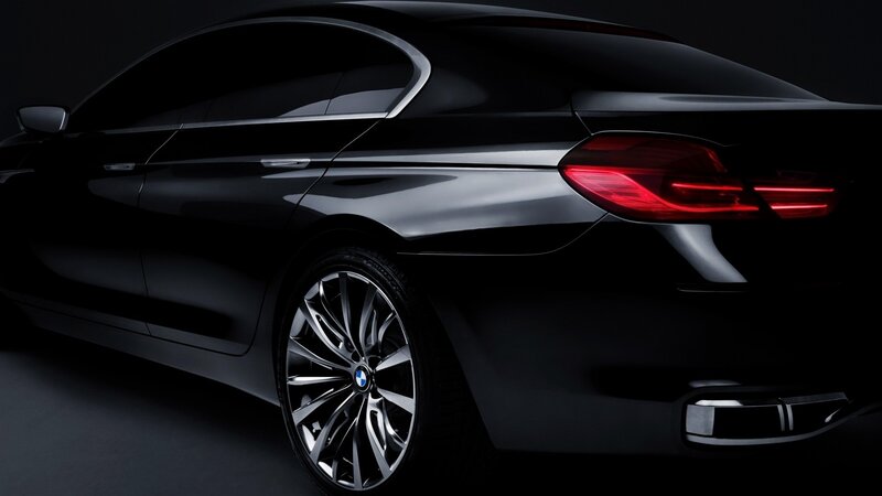 black bmw sedan rear view
