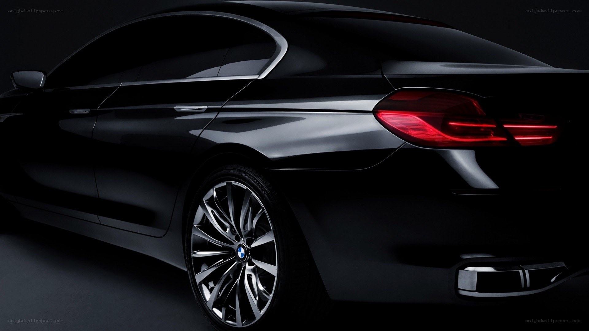 black bmw sedan rear view