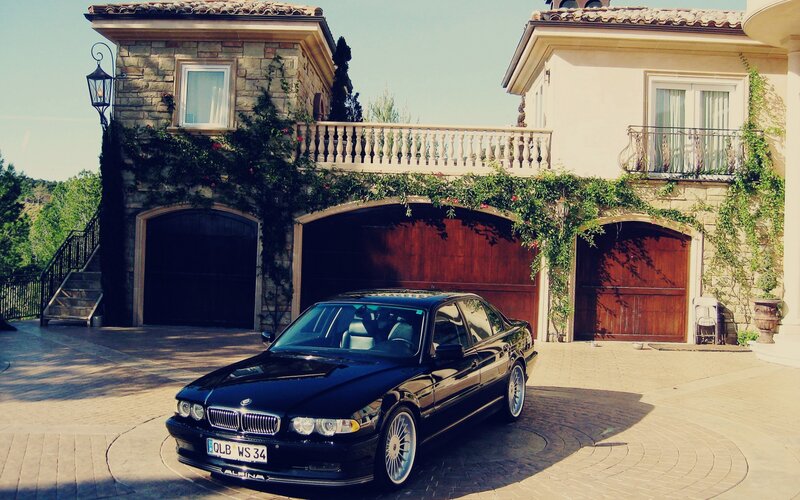 Black BMW Sedan — Serene, Afternoon, Photograph, House