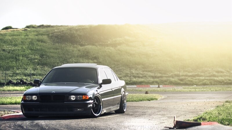 Black BMW Sedan — Serene, Sunset, Photograph
