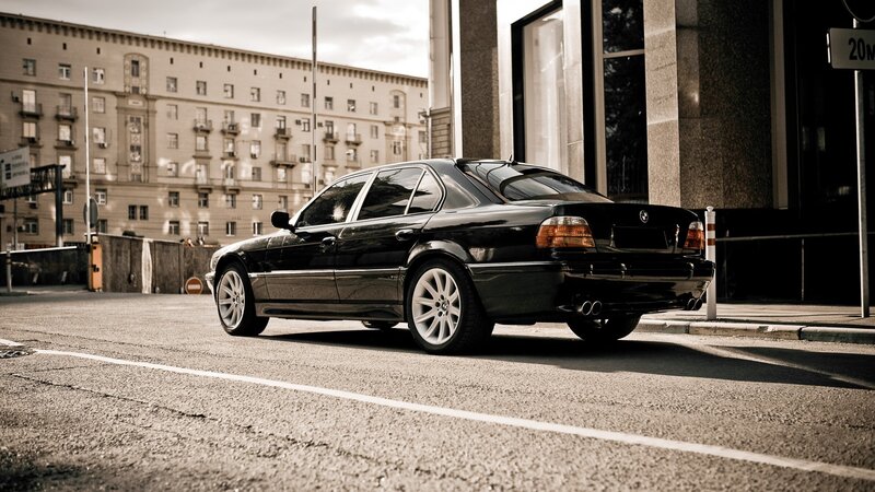 Black BMW Sedan — Urban, Afternoon, Photograph, Building