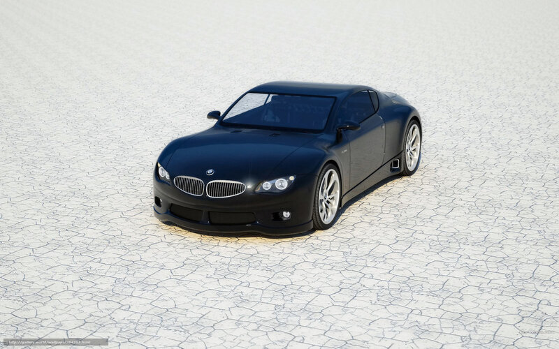 Black BMW sports car on cracked ground