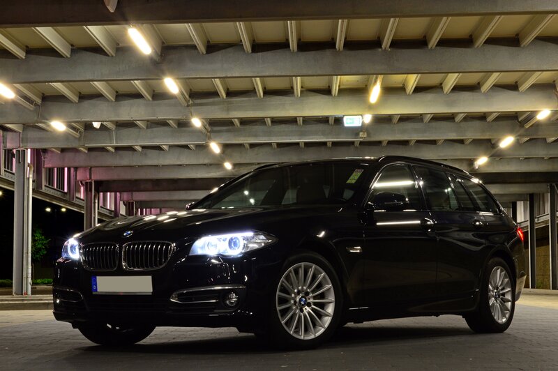 Black BMW Station Wagon — Dramatic, Night