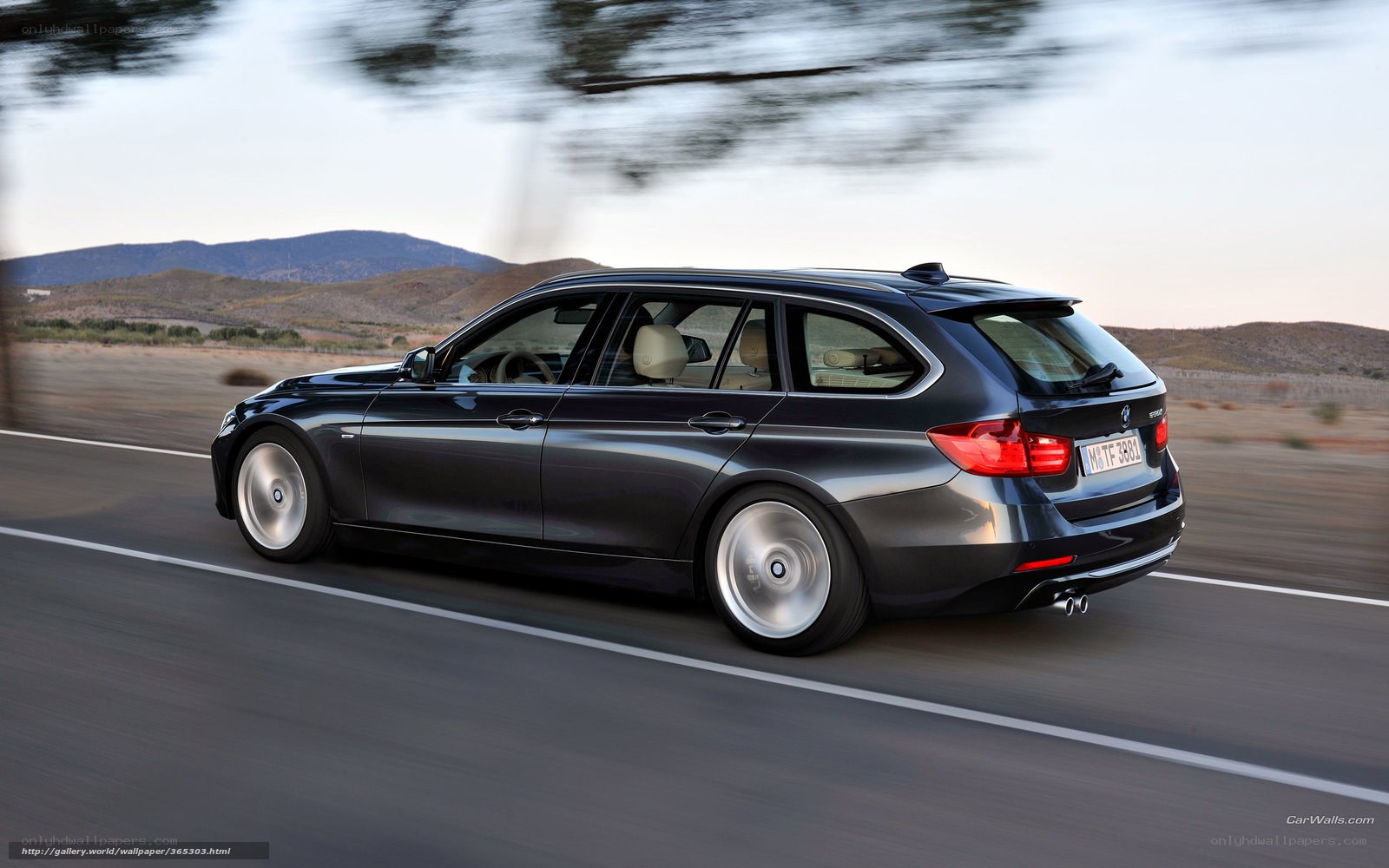 black bmw station wagon on road
