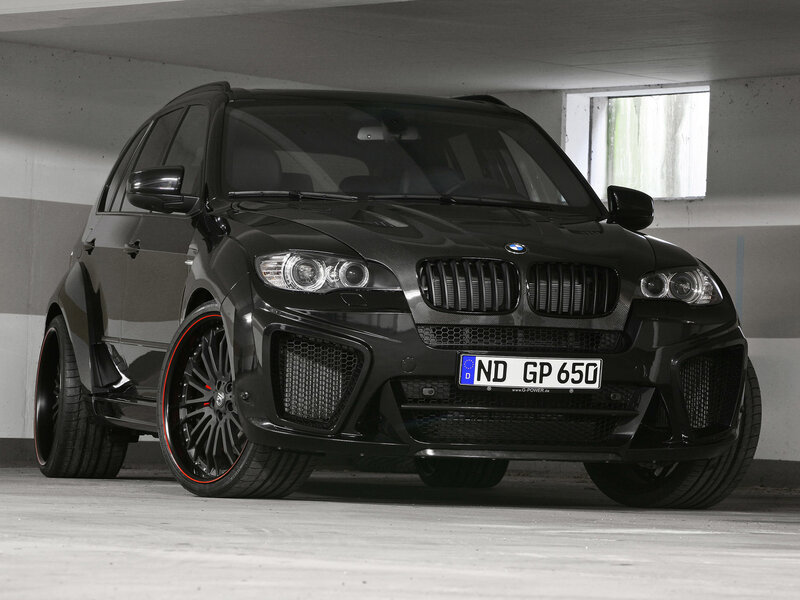 black bmw suv in garage