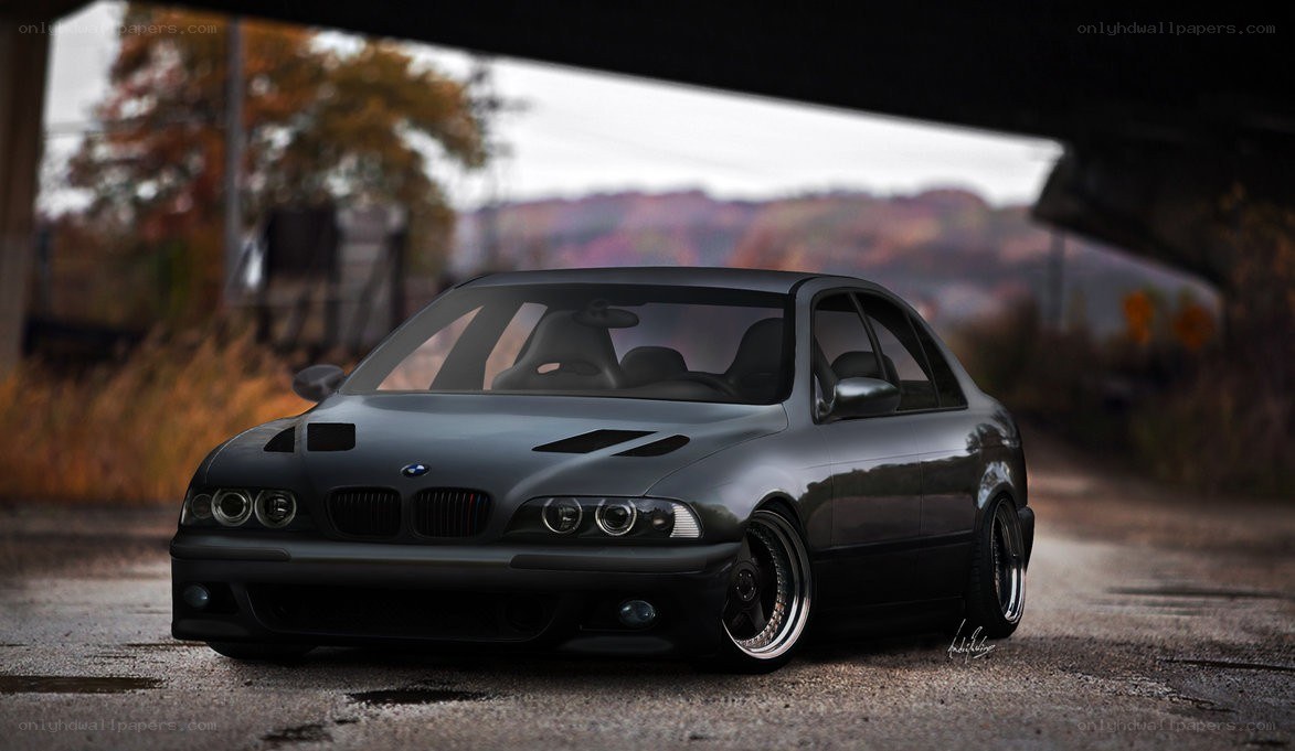 black bmw under overpass