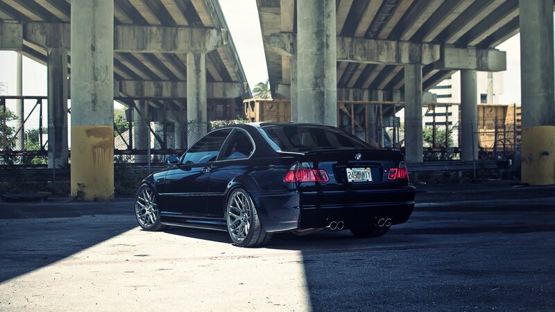 black bmw under overpass