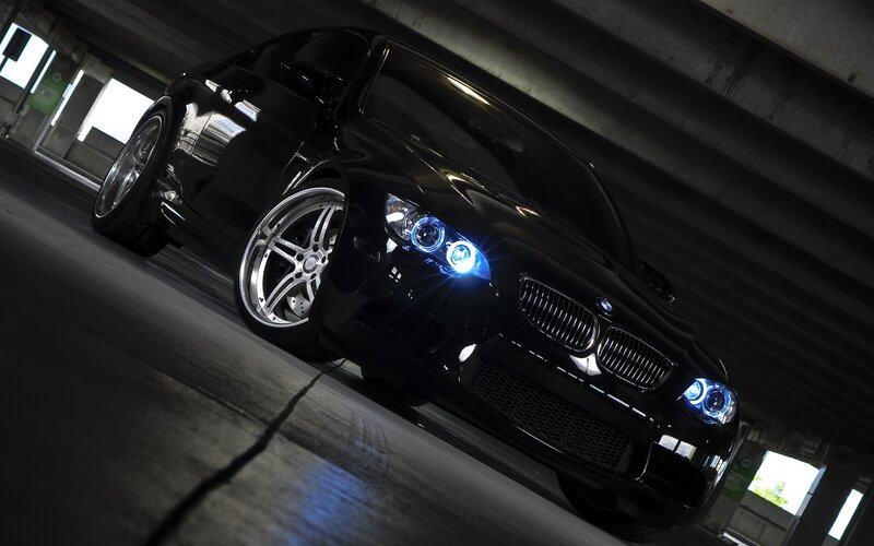 black bmw with blue headlights