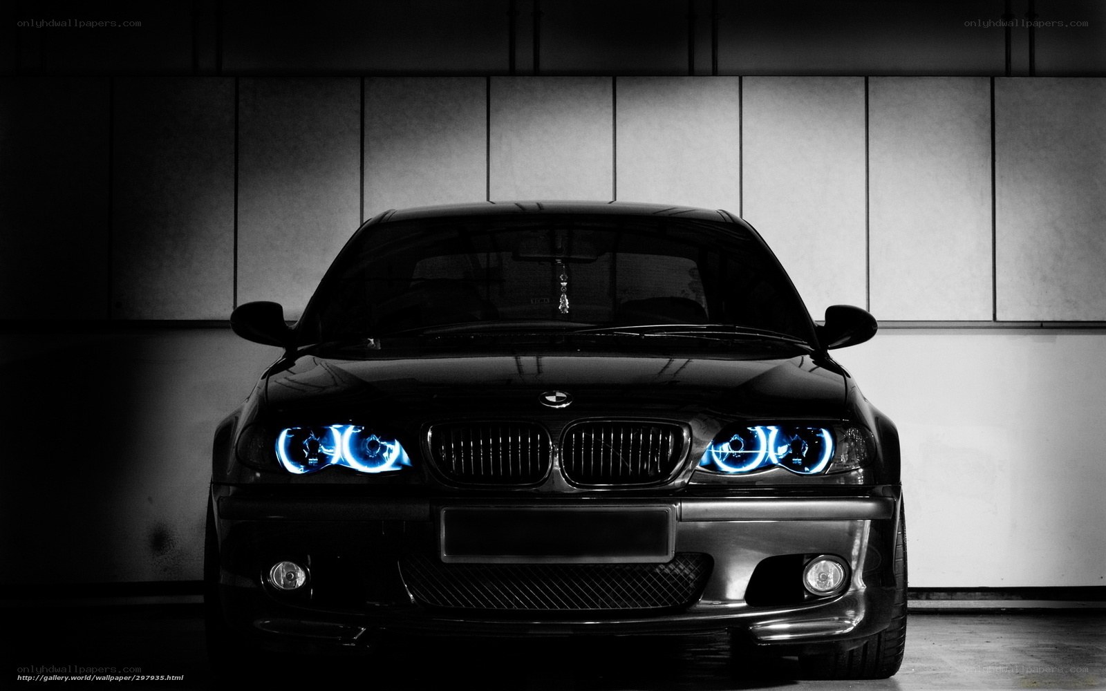 black bmw with blue headlights