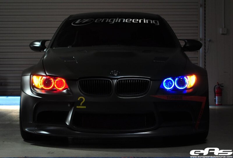 Black BMW with custom headlights