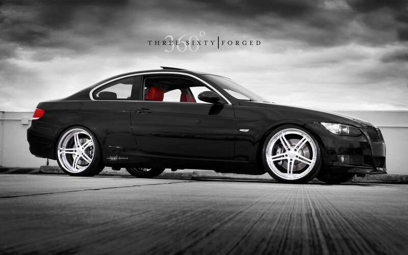 Black BMW with custom wheels