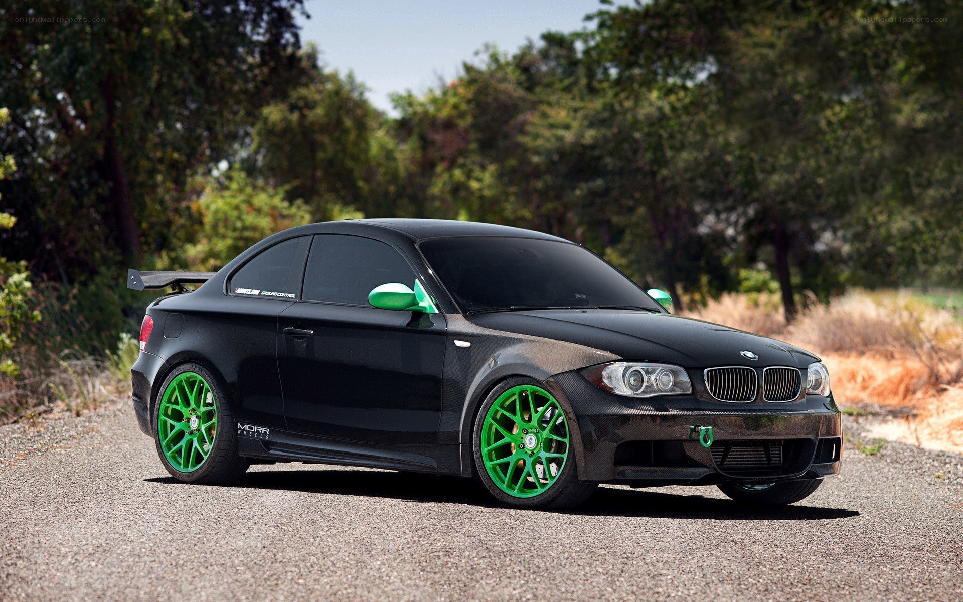 black bmw with green wheels