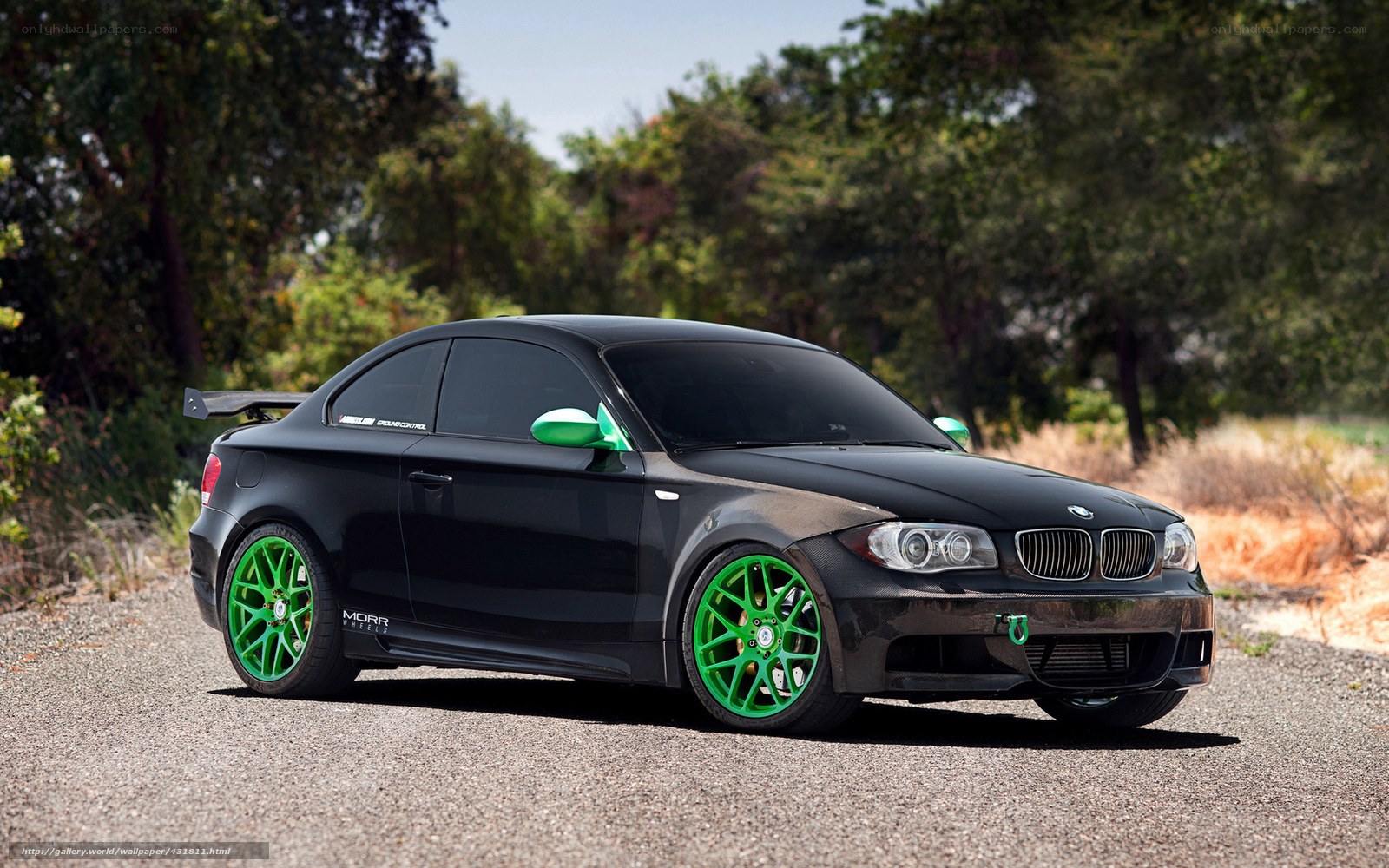 black bmw with green wheels