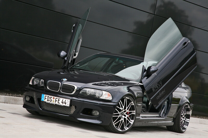 Black BMW with gullwing doors