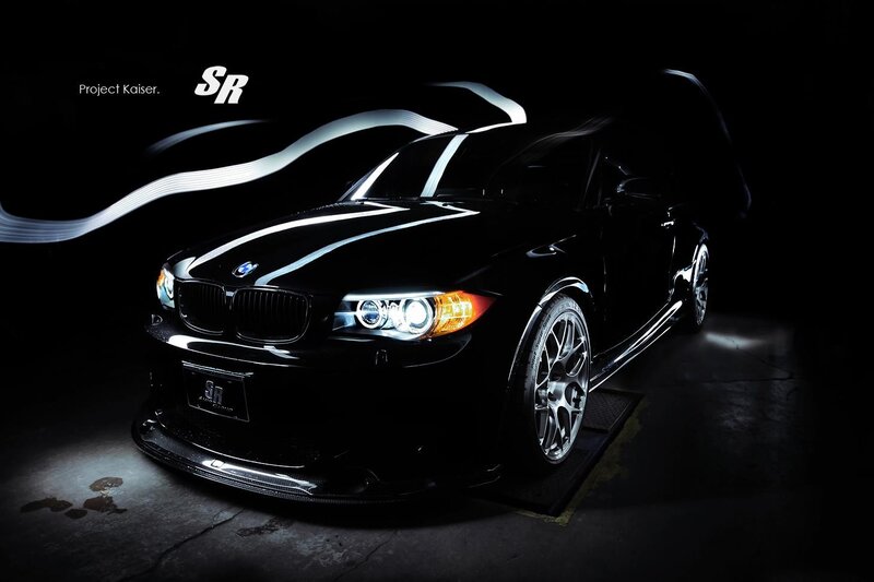 Black BMW with light trails