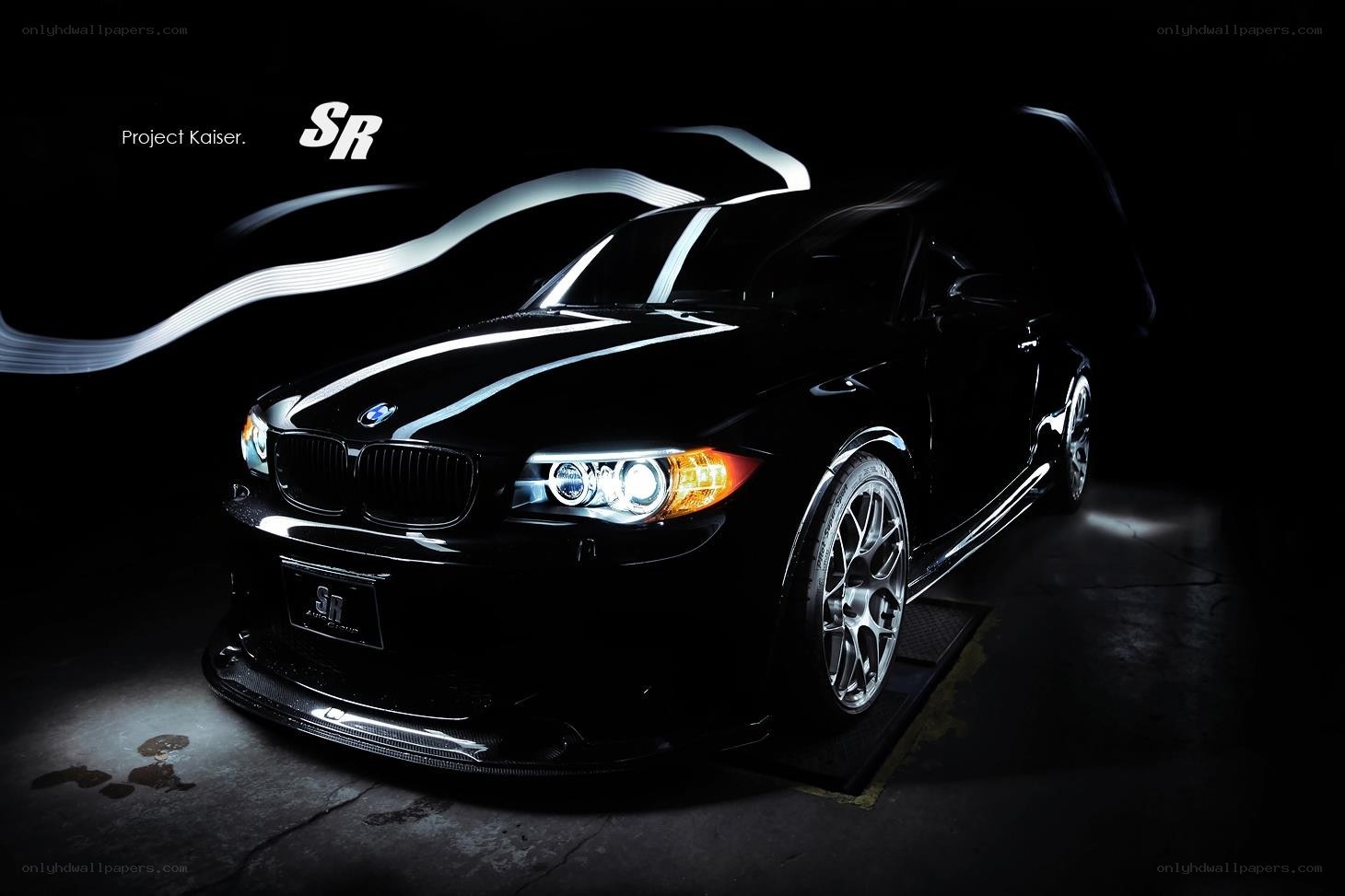 Black BMW with light trails