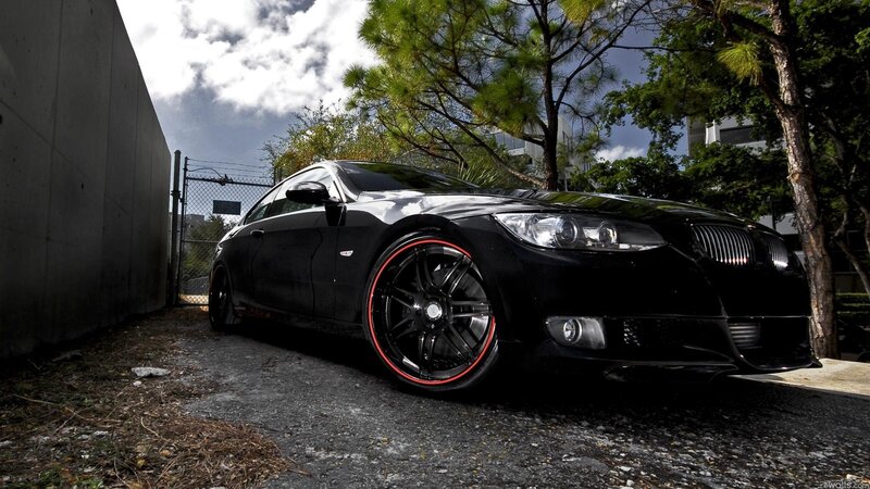 black bmw with red rims