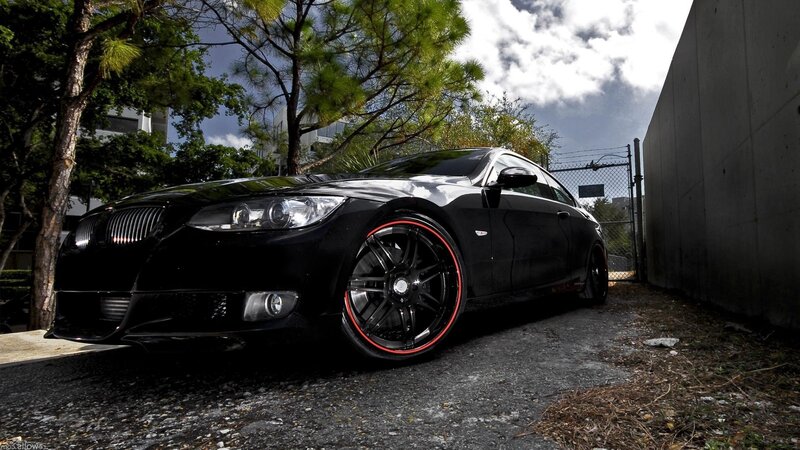 black bmw with red rims